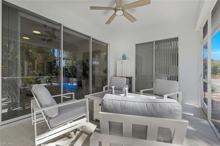 Outdoor patio with ceiling fan and extended patio