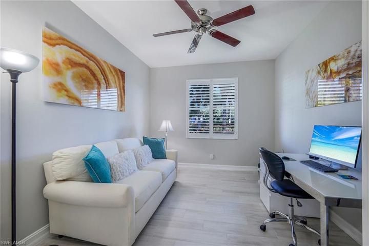Den with ample space for guests or perfect for an office!