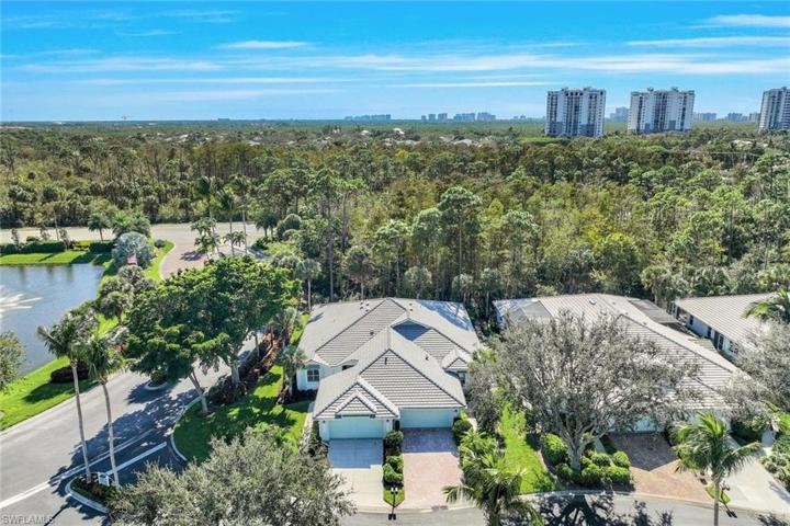 Drone footage of the villa to the left with great corner lot!