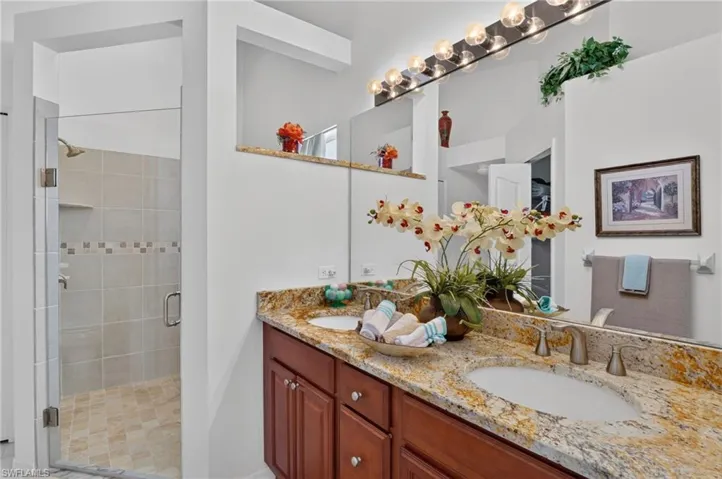 Owner's suite bathroom, has a walk in closet