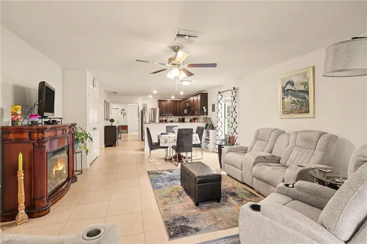 Open-concept living space featuring tile flooring throughout