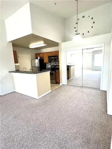 View of dining area, kitchen and large pantry