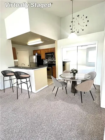 Dining area and breakfast bar - Virtually staged