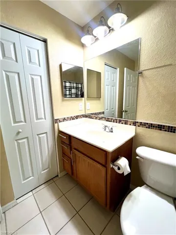 Guest bathroom with linen closet