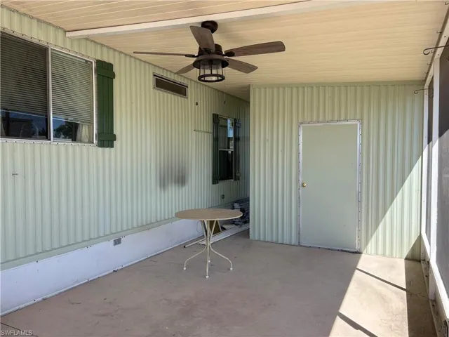 View of patio featuring ceiling fan