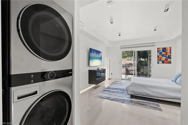 Modern stacked laundry appliances with a clean, contemporary design