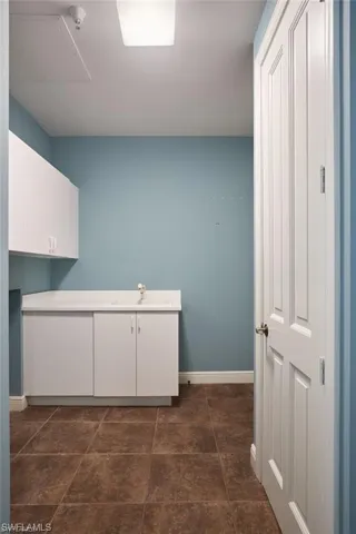 Laundry area with sink