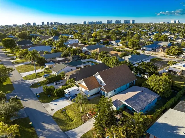 Aerial view of residential area featuring skyline