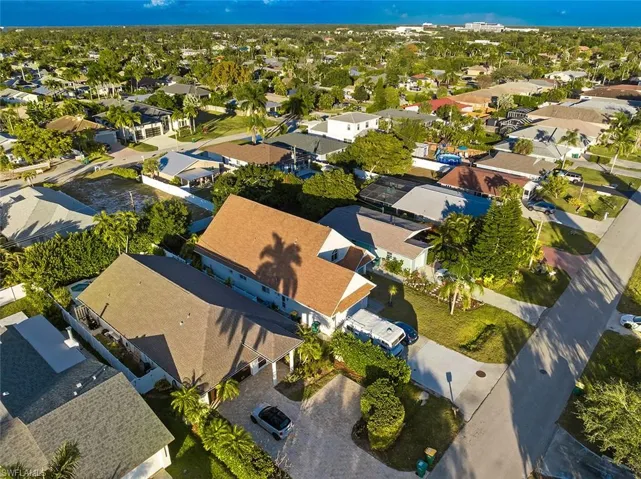 View of property location with nearby suburban area