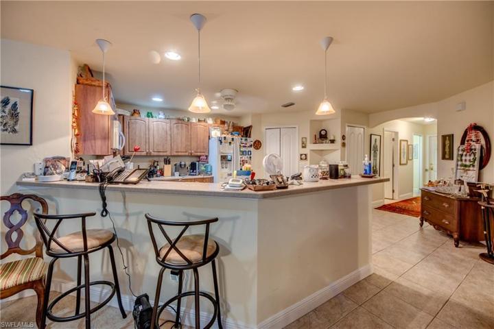 Kitchen with bar/ Tile floors