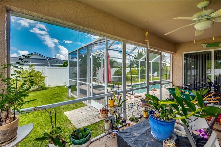 left unit - large, screened lanai porch.