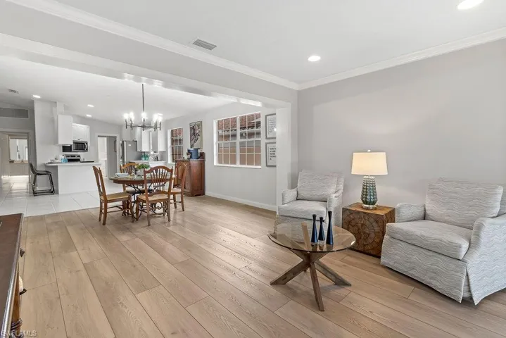 Sitting area adjacent to dining and kitchen. Wonderful open floor plan.