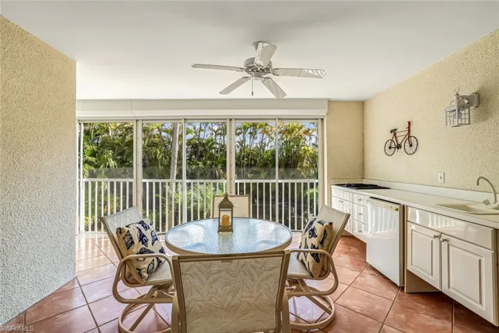 LANAI WITH SUMMER KITCHEN & ELECTRIC SHUTTERS