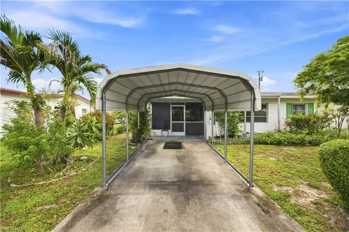 Front of house with carport