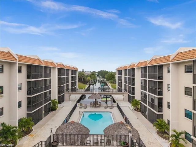 Community pool with a patio area