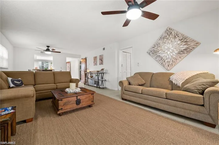 Tiled living area with ceiling fan