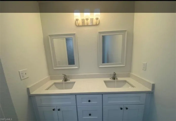 Full bath with double vanity