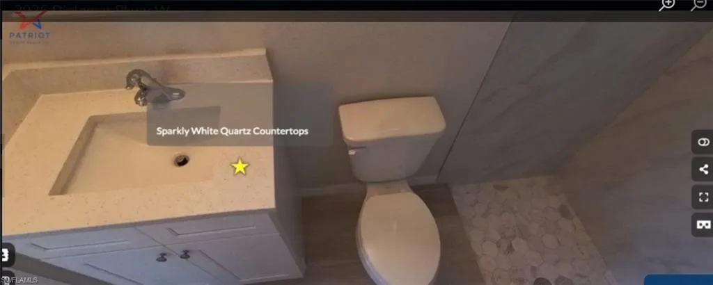 Bathroom with toilet and vanity