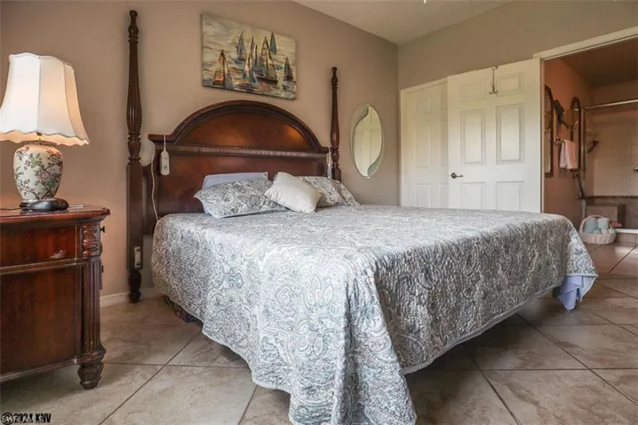 Bedroom with tile patterned flooring