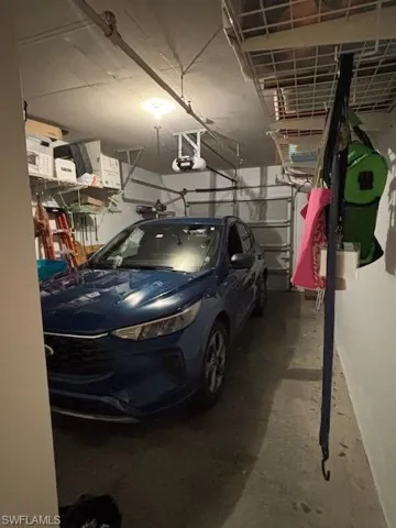 inside of Garage featuring a garage door opener