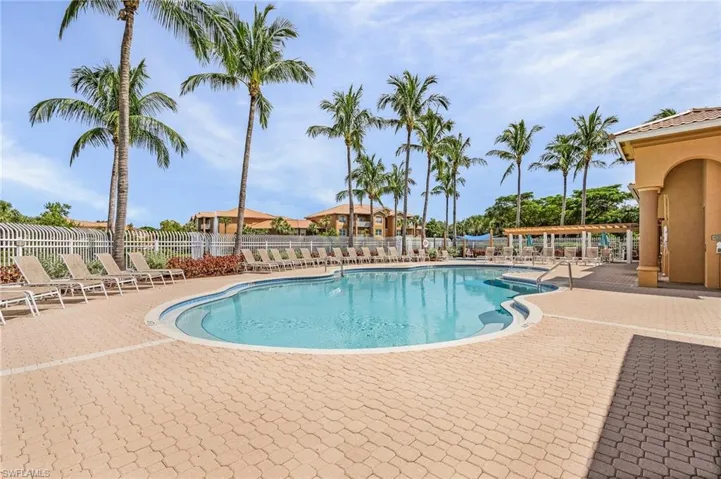 Community pool featuring a patio area