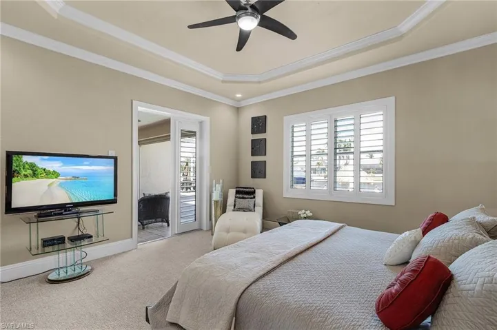 Pool deck is accessed via this set of French doors.