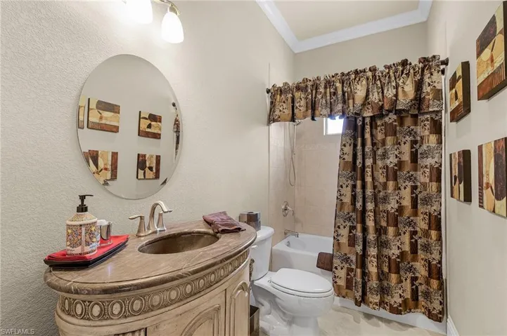 Beautiful custom vanity in secondary bathroom
