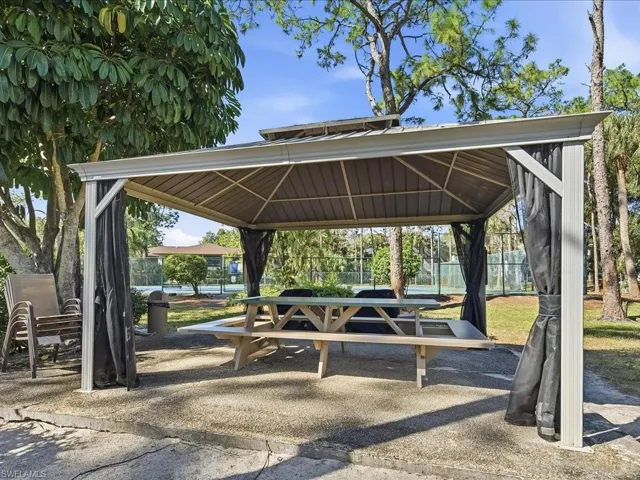 View of home's community with a patio area and a gazebo