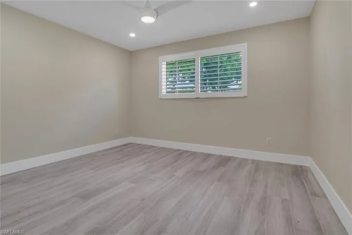 Unfurnished room featuring light wood-style flooring and recessed lighting