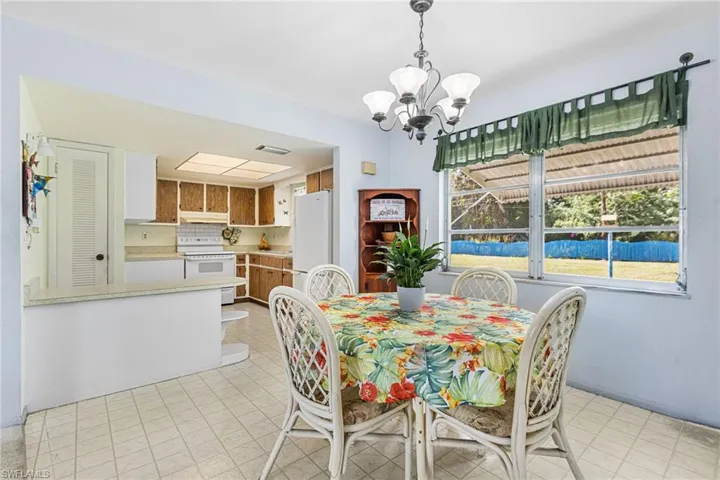 Dining area with an inviting chandelier