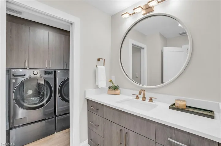 Guest Suite Bathroom and designer decorations, lighting and Washer/Dyer