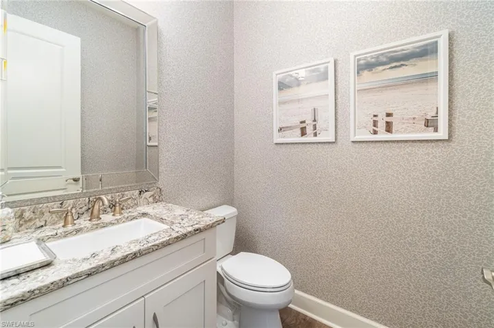 Bathroom with vanity and toilet
