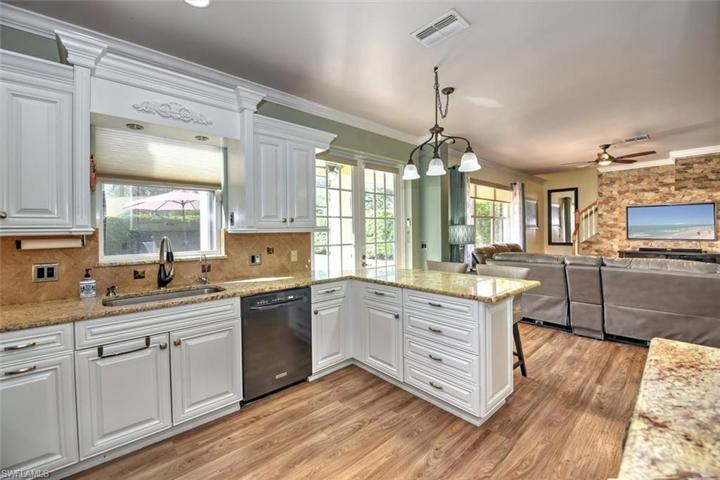 Custom Kitchen to Great Room and French Doors to Pool Area