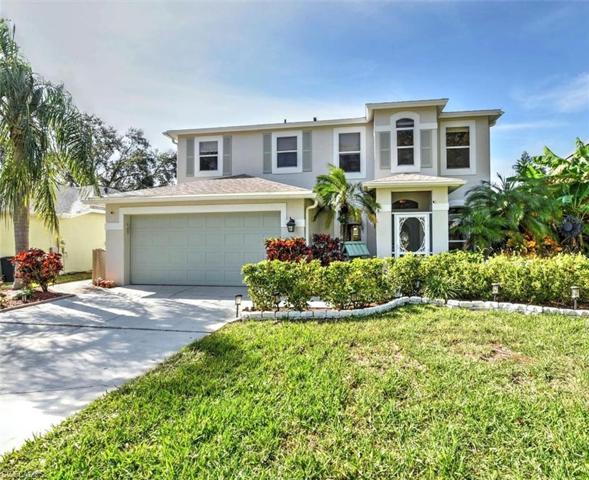Beautifully Landscaped Front View with Screened Covered Entry
