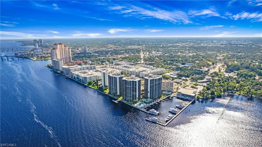 View of urban area featuring a nearby body of water