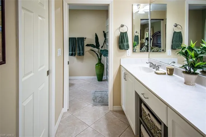 Bathroom featuring vanity and light tile patterned floors