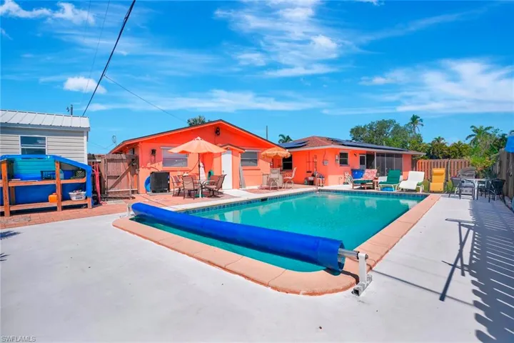 View of swimming pool with a patio