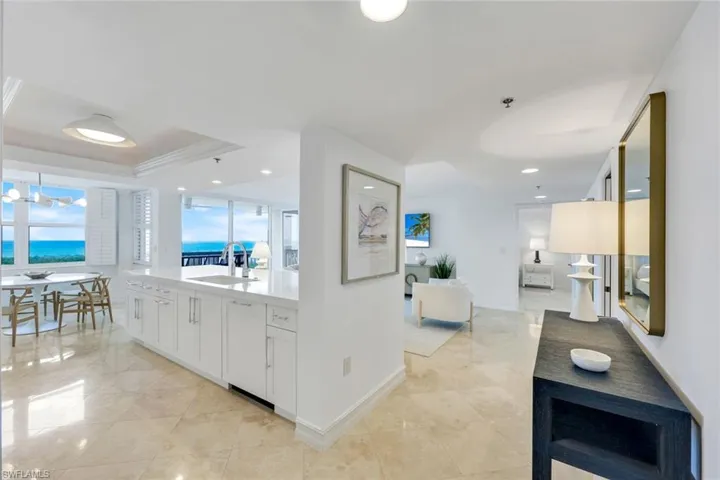 Seamless Living with Marble Floors & Neutral Color Palette Throughout