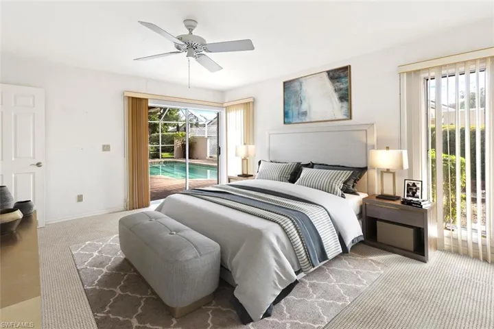 Carpeted bedroom with access to exterior, baseboards, and ceiling fan