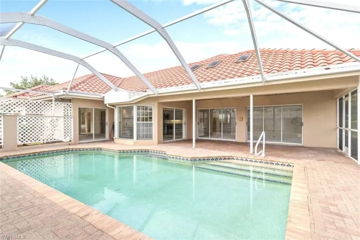 Outdoor pool featuring a patio area and a lanai