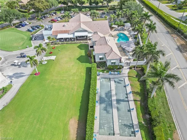 Aerial view of property's location featuring a pool