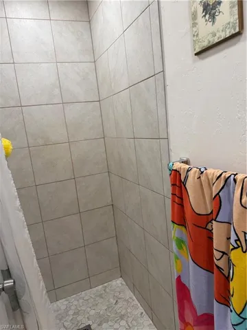 Bathroom with a stall shower