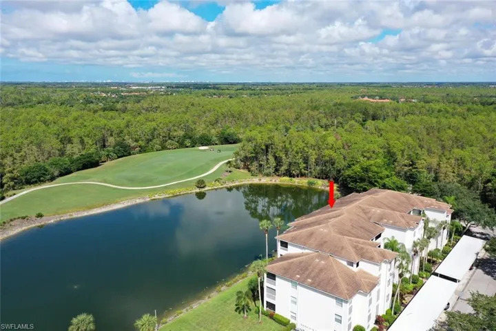 Bird's eye view of a heavily wooded area and a large body of water