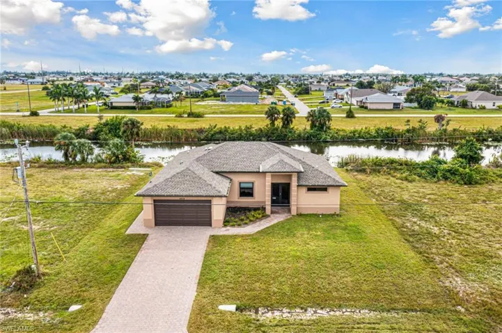 Bird's eye view with a residential view and a water view