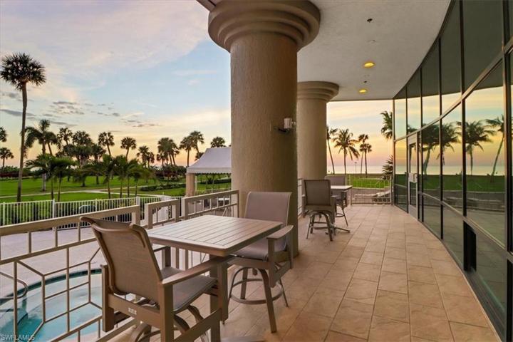 Sitting Area Overlooking the Private Community Pool, Spa, & Beach