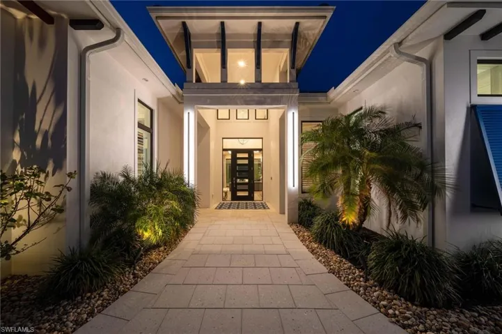View of exterior entry at twilight