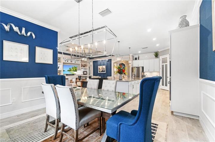 The dining area is made convenient by its proximity to the kitchen but yet maintains an elegance with it's detailed decor.