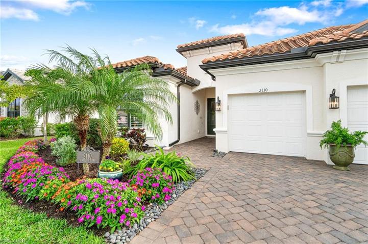 2110 Antigua Lane.  Stunning home with professionally design landscaping welcomes you in.
