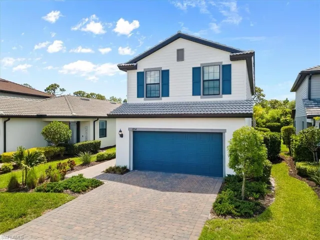 Front of property with a garage