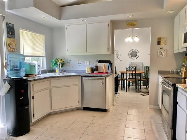 Sliding glass doors go to the back yard.  Kitchen is to the left.